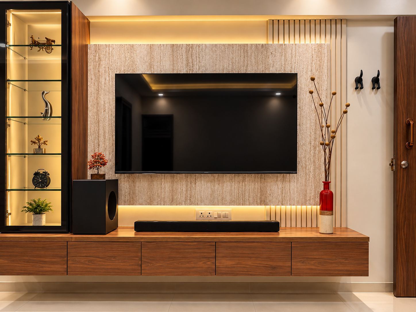 Stone-texture media wall with a floating console and lit glass cabinet