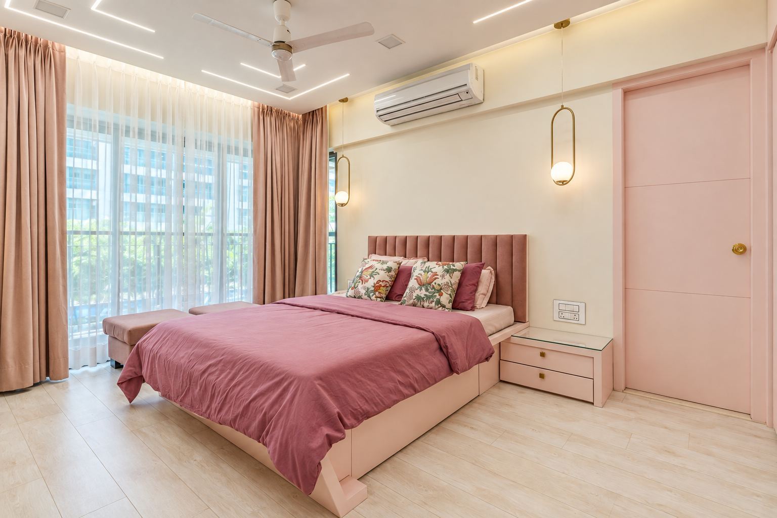 Bedroom with a pink channel-tufted headboard and pink curtains