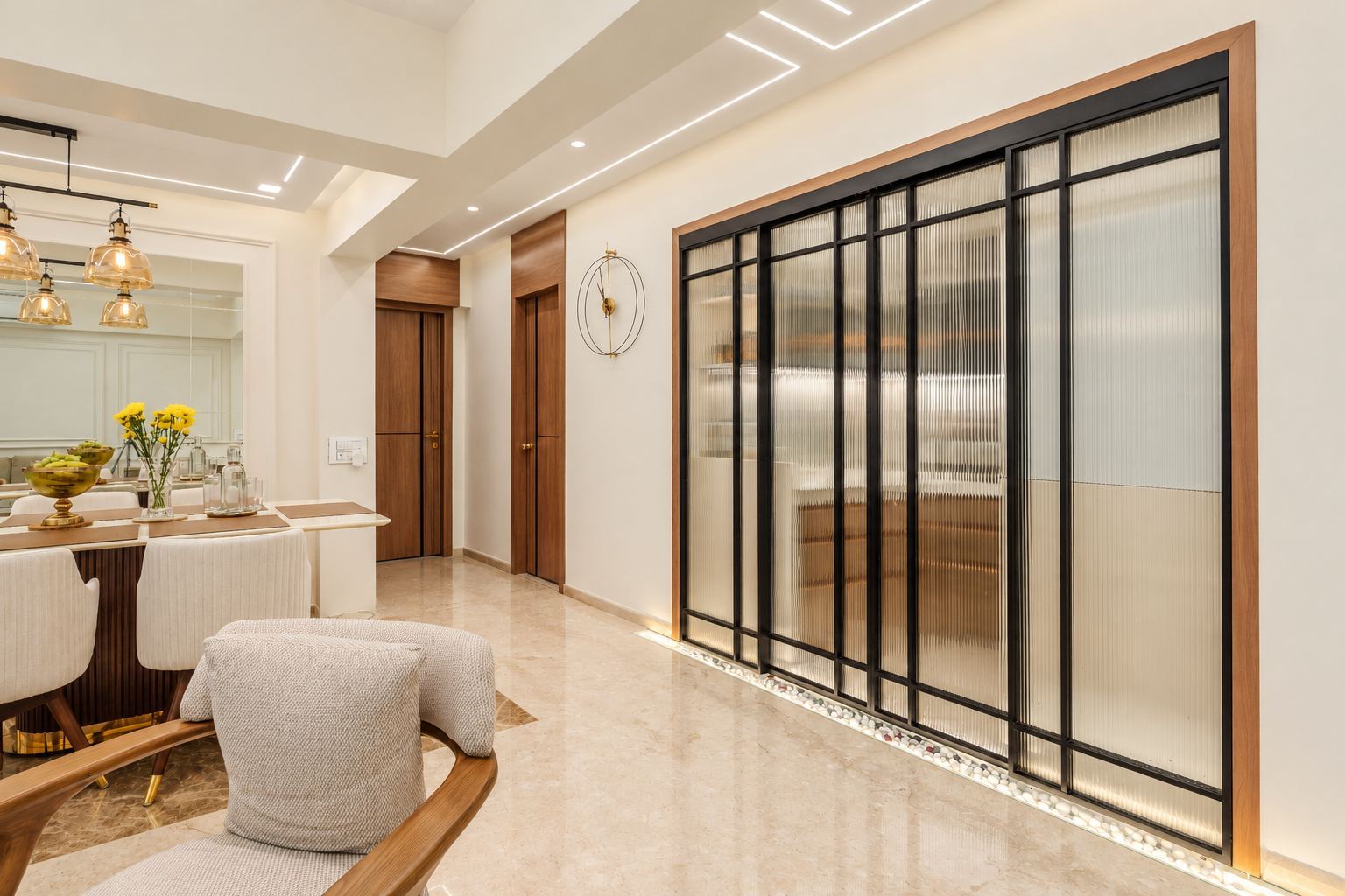 Black-framed fluted glass sliding doors beside the dining area