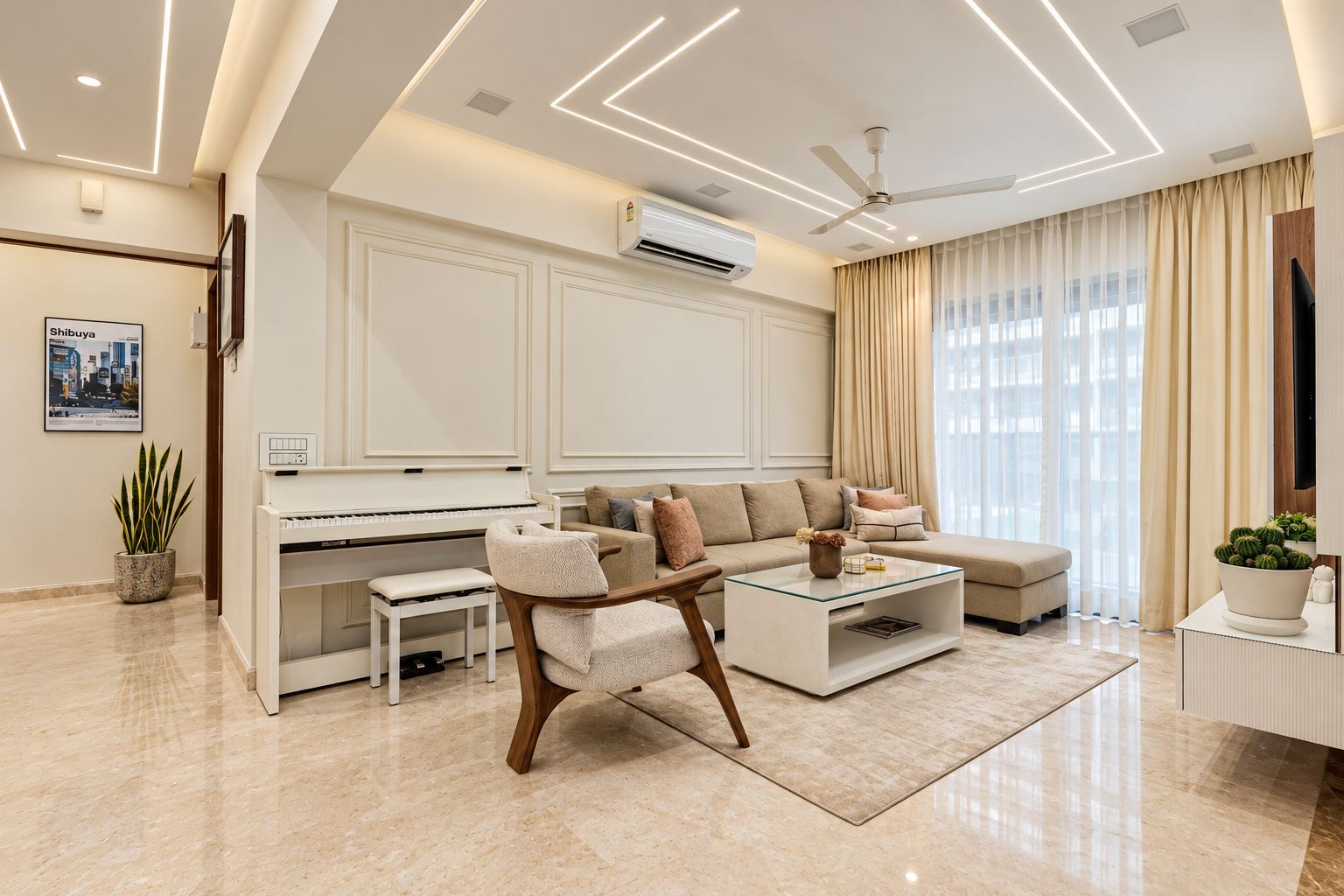 Daylit living room with moulded wall panels, a white piano and a beige L-shaped sofa