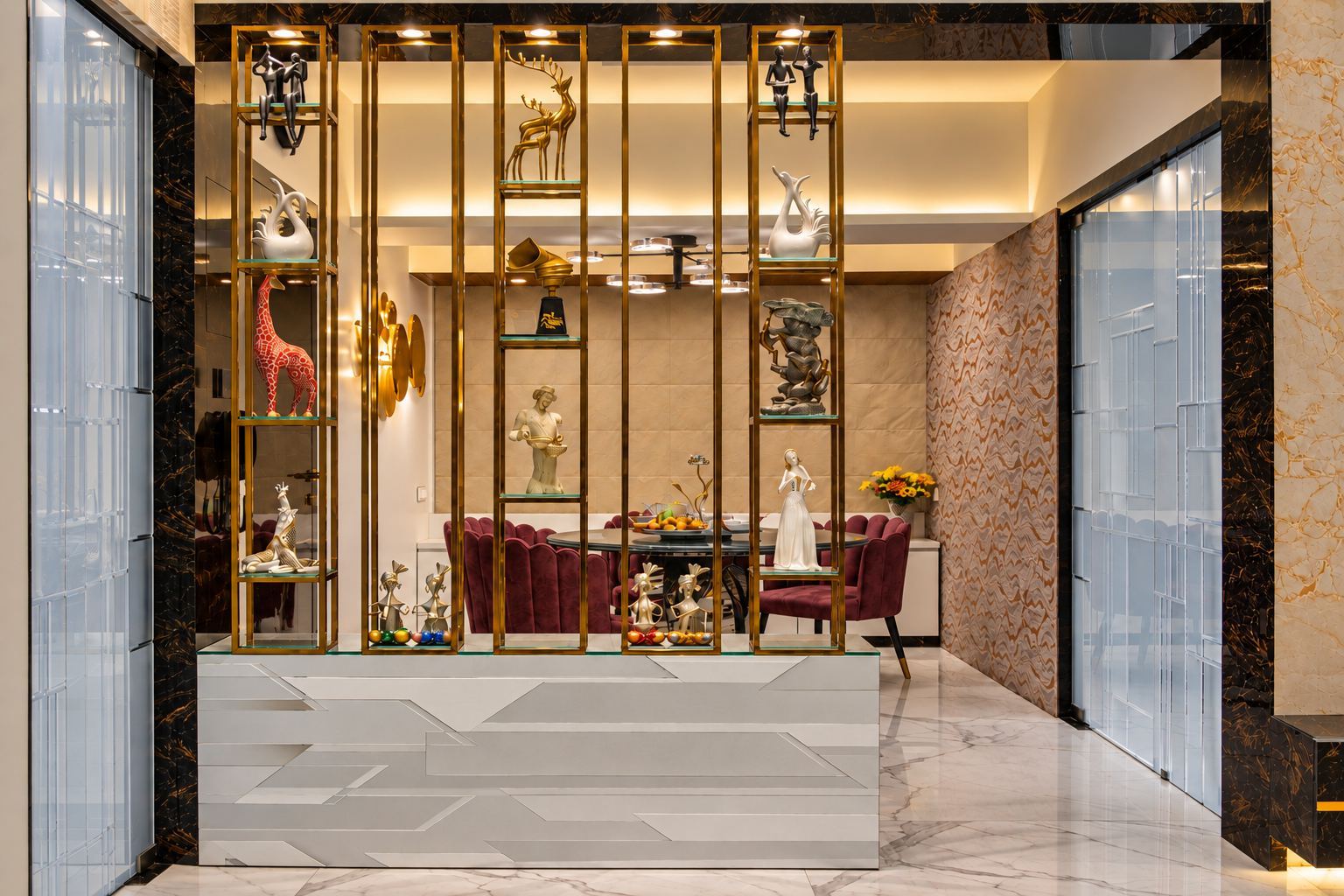 Brass-framed open shelf between living and dining